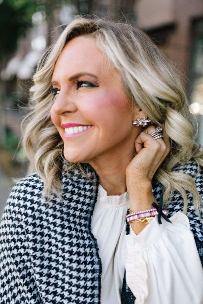 J. Crew Holiday by popular Nashville fashion blog, Hello Happiness: image of Natasha Stoneking standing outside and wearing a J. Crew double sided scarf, Ruffle Sleeve Top Satin Top in Crepe, Hayden Kick Out Crop Pant in Wool, Double Sided Scarf in Houndstooth Dot, and Green Embossed Leather Pumps.