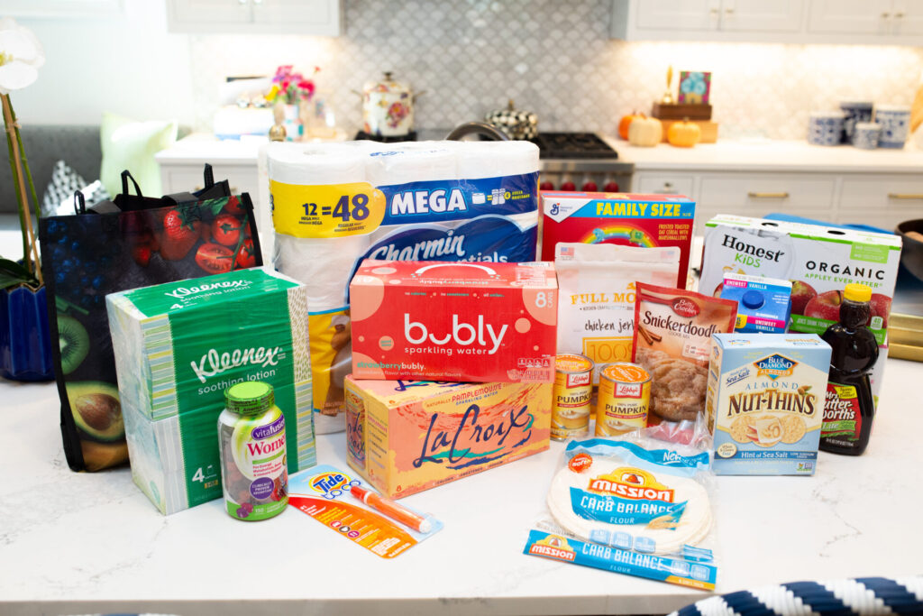 Walmart Membership by popular Nashville lifestyle blog, Hello Happiness: image of Kleenex, Bubly, La Croix, Mission tortillas, Charmin mega roll toilet paper, Betty Crocker snickerdoodle mix, Almond things, Libby's canned pumpkin, Mrs. ButterWorth's syrup, Lucky Charms cereal and Tide to-go stick. 