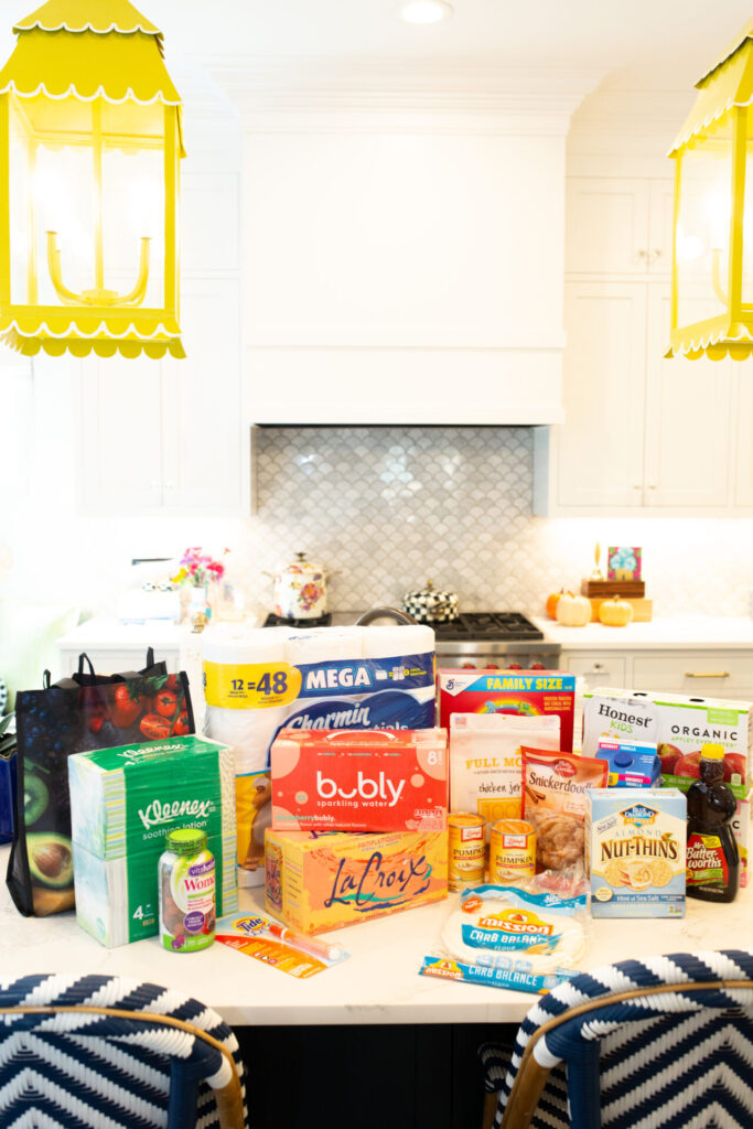 Walmart+ by popular Nashville lifestyle blog, Hello Happiness: image of a kitchen counter covered with Walmart food products. 