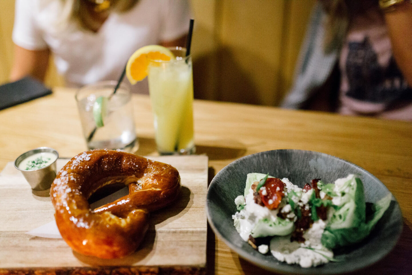 Nashville Hot Spots by popular Nashville travel blog, Hello Happiness: image of a pretzel and a salad.