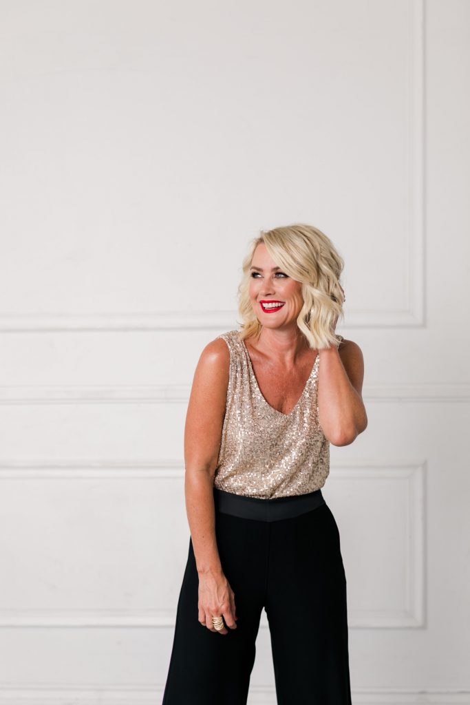 Gibson x Hi Sugarplum... The Holiday Collection by popular Nashville fashion blog, Hello Happiness: image of a woman wearing a Nordstrom Gibson x Hi Sugarplum! Holiday Confetti Double V-Neck Tank and Nordstrom Gibson x Hi Sugarplum! Holiday Brigitte High Waist Wide Leg Pants. 