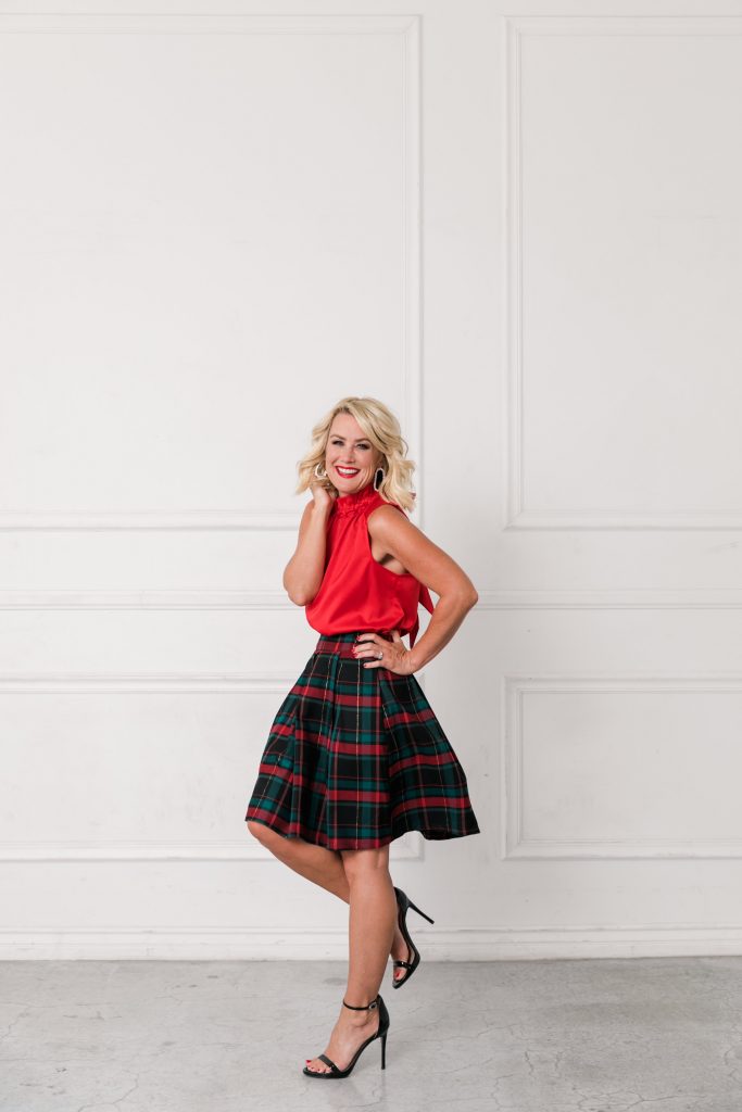 Gibson x Hi Sugarplum... The Holiday Collection by popular Nashville fashion blog, Hello Happiness: image of a woman wearing a Nordstrom Gibson x Hi Sugarplum! Holiday Noel Bow Back Top and Nordstrom Gibson x Hi Sugarplum! Holiday Etoile Jacquard Skirt. 