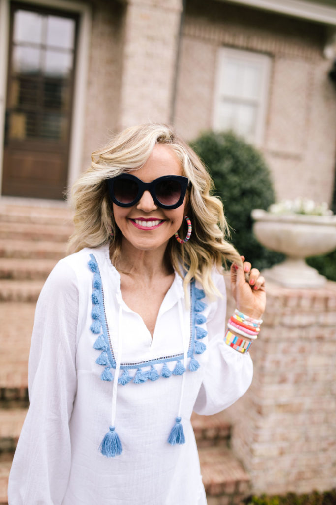 Top Amazon Products by popular Nashville life and style blog, Hello Happiness: image of a woman wearing a pair of Amazon Freckles Mark Butterfly Sunglasses Semi Cat Eye Glasses.