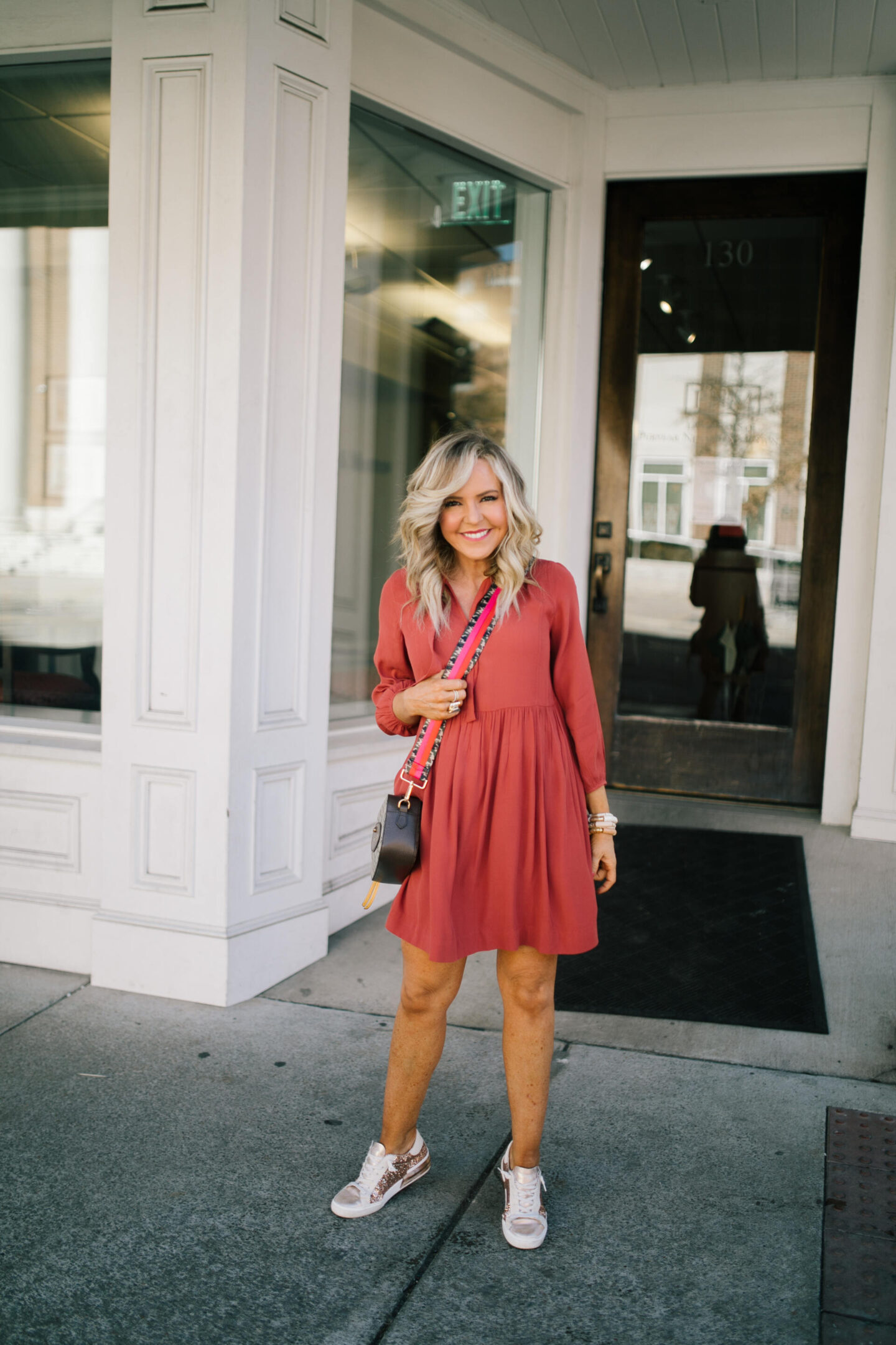 Walmart Free Assembly by popular Nashville fashion blog, Hello Happiness: image of Natasha Stoneking wearing a Walmart Free Assembly long sleeve tie neck dress.