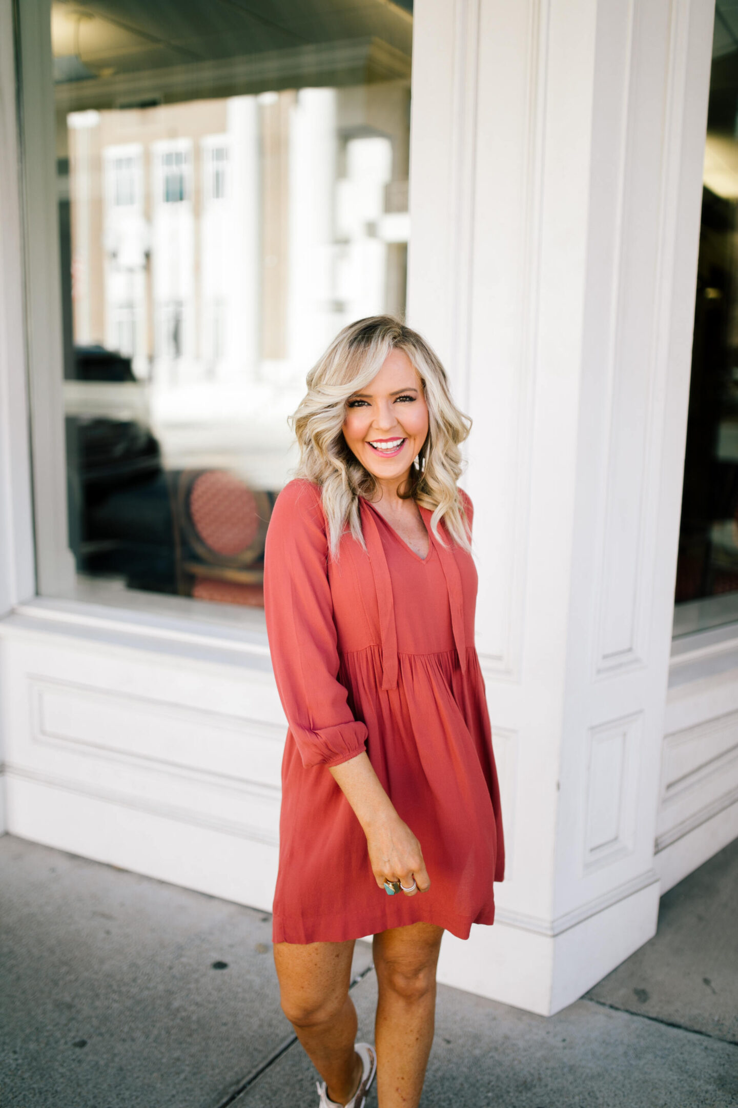 Walmart Free Assembly by popular Nashville fashion blog, Hello Happiness: image of Natasha Stoneking wearing a Walmart Free Assembly long sleeve tie neck dress.