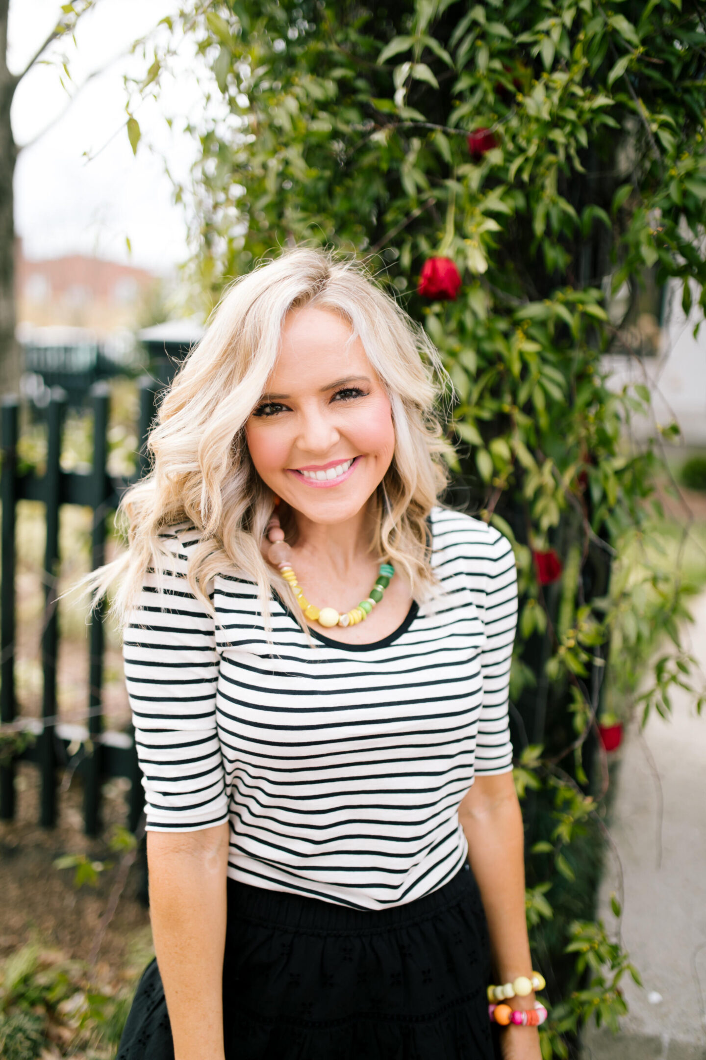Accessory Concierge by popular Nashville fashion blog, Hello Happiness: image of Natasha Stoneking wearing a Accessory Concierge Here Comes the Sun Collar, striped ballet top and eyelet skirt.