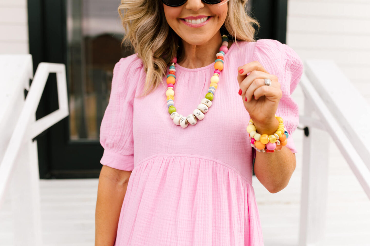 Accessory Concierge by popular Nashville fashion blog, Hello Happiness: image of Natasha Stoneking wearing a Accessory Concierge Danica Dress, Cake by the Ocean bracelet, Walking on Sunshine bracelet, Camilla Heels, and holding a Mallorca tote.