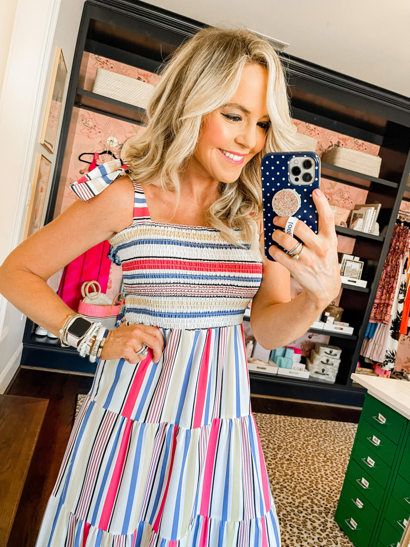 Social Threads by popular Nashville fashion blog, Hello Happiness: image of Natasha Stoneking wearing a Social Threads red, white, blue, and tan stripe, smock top tie strap maxi dress. 