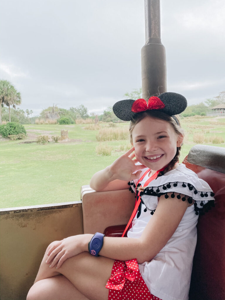 Disney Creators Celebration by poplar Nashville travel blog, Hello Happiness: image of a little girl on Walt Disney World's Kilimanjaro Safari ride. 