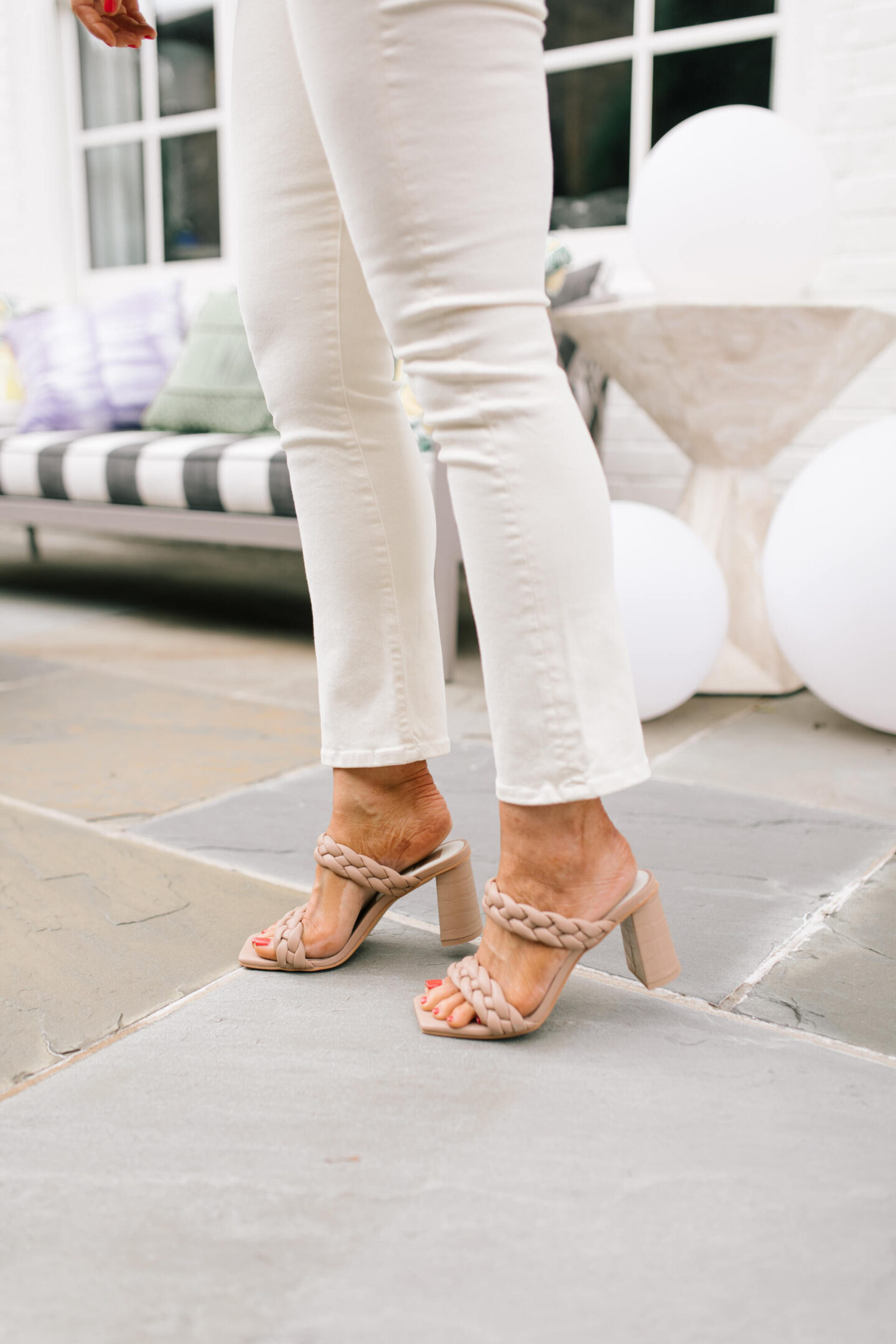 Fall Outfits by popular Nashville fashion blog, Hello Happiness: image of Natasha Stoneking wearing a Evereve ribbed tank, vanilla denim, and paily heels.