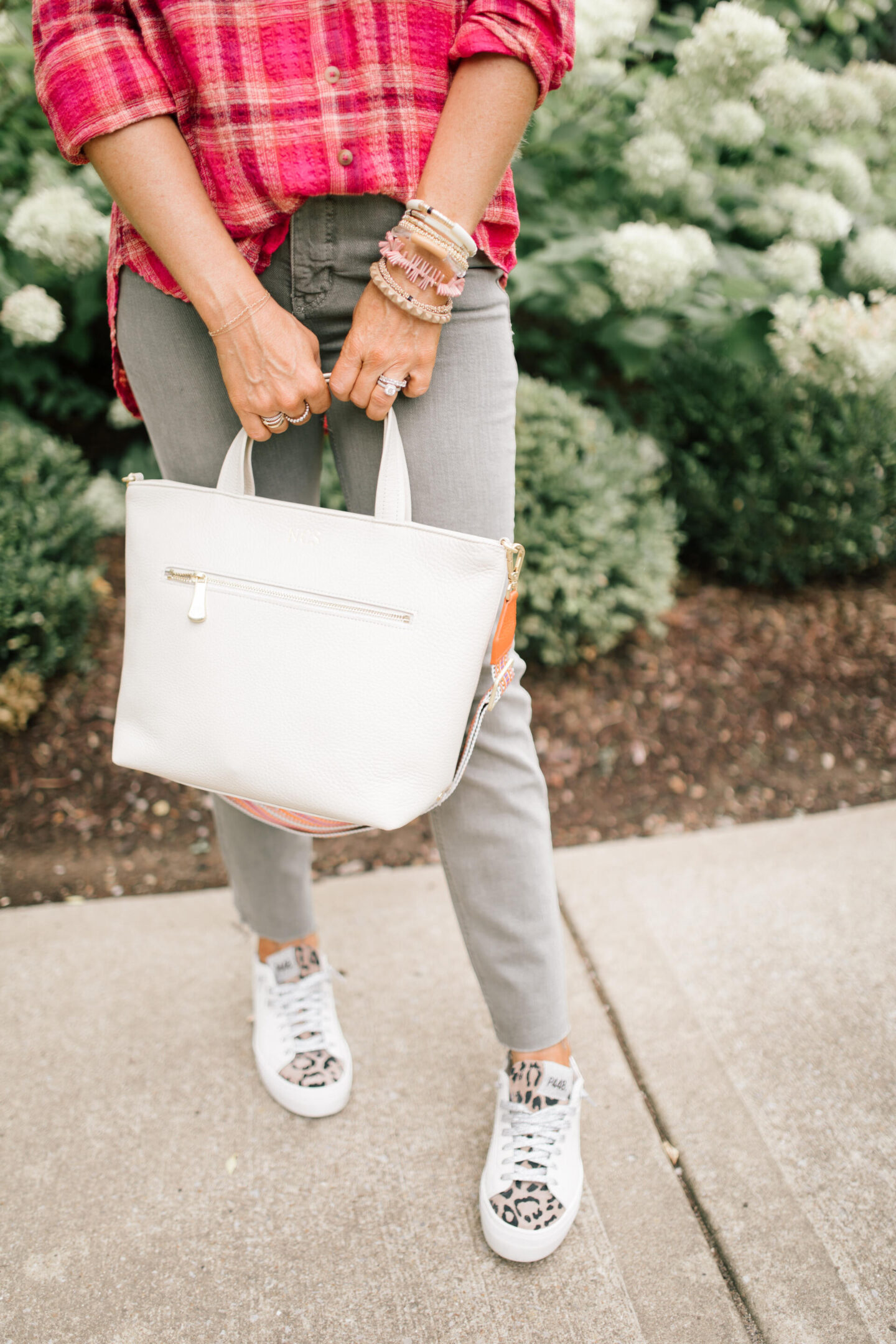 Pilcro Jeans by popular Nashville fashion blog, Hello Happiness: image of Natasha Stoneking wearing Pilcro vintage straight jeans, plaid tunic top and p448 sneakers.