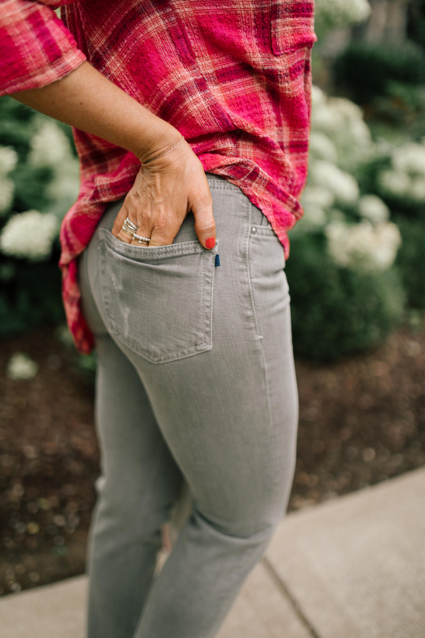 Pilcro Jeans by popular Nashville fashion blog, Hello Happiness: image of Natasha Stoneking wearing Pilcro vintage straight jeans, plaid tunic top and p448 sneakers.