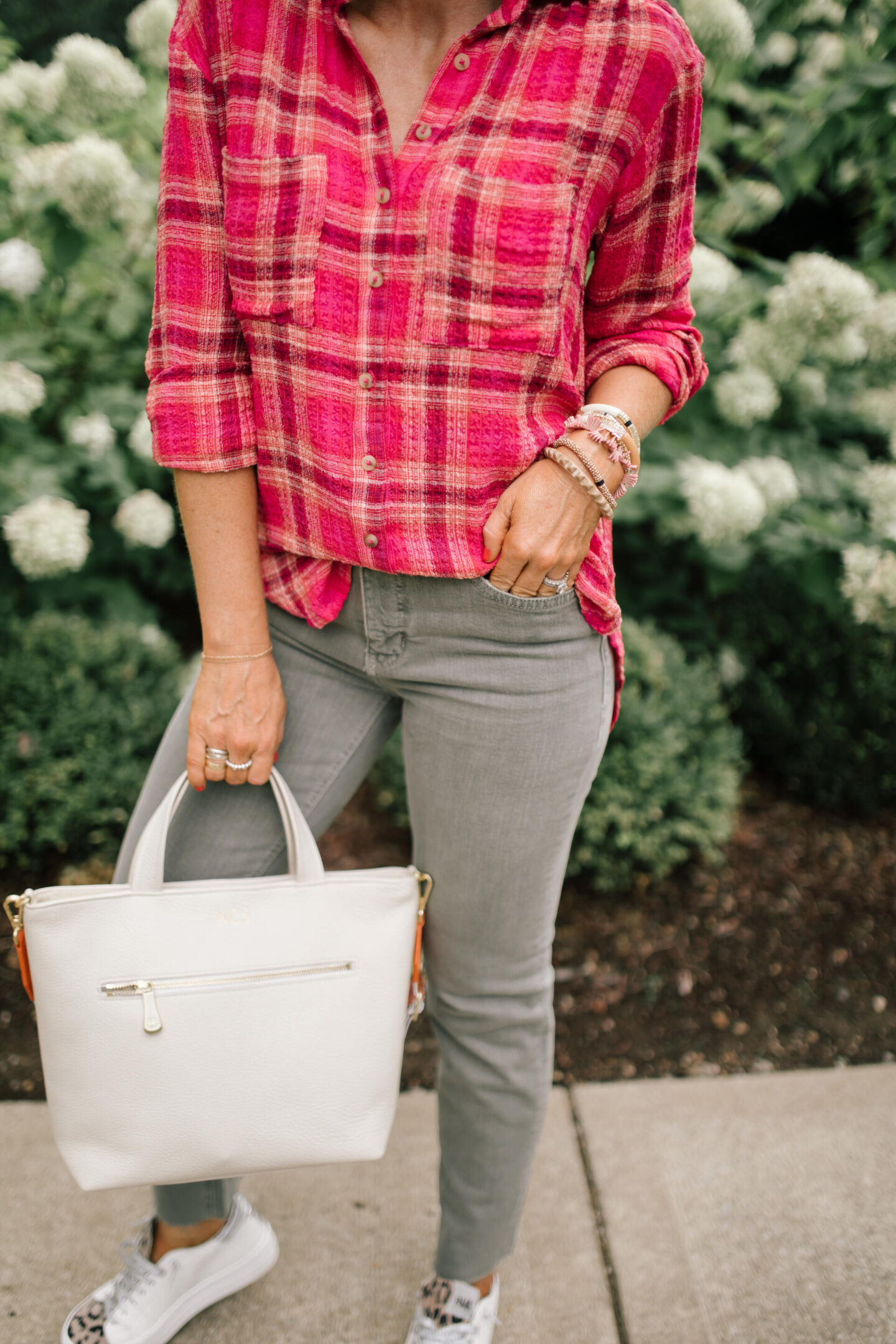 Pilcro Jeans by popular Nashville fashion blog, Hello Happiness: image of Natasha Stoneking wearing Pilcro vintage straight jeans, plaid tunic top and p448 sneakers. 