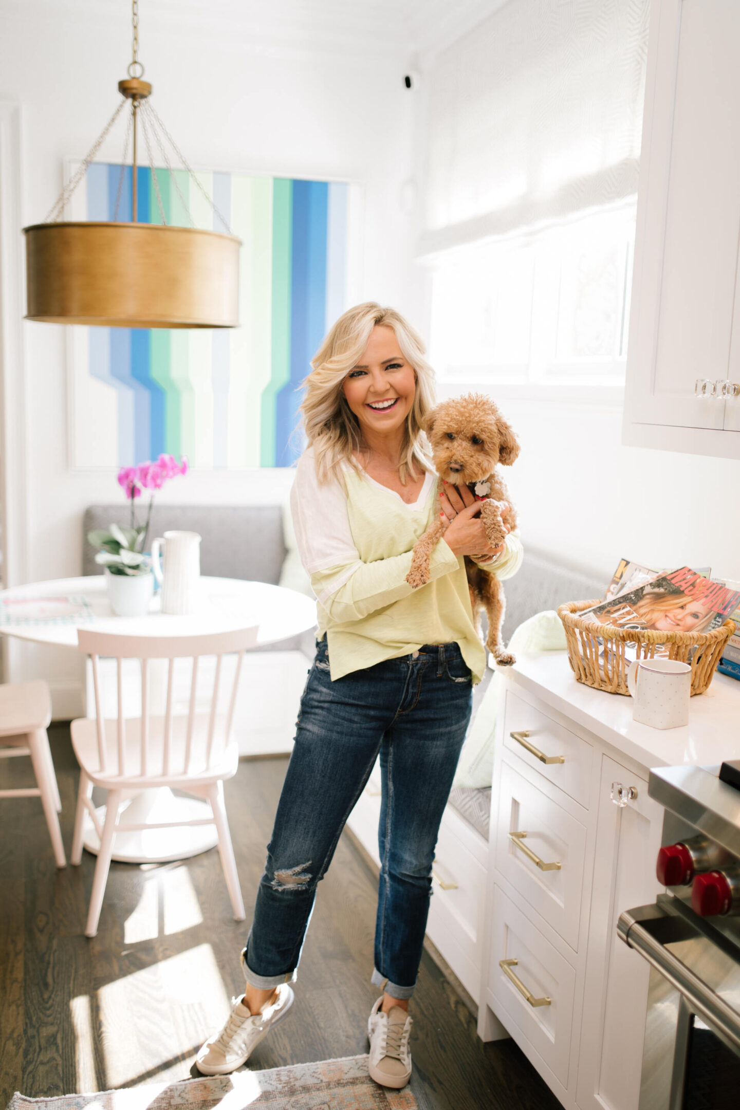 Pilcro Jeans by popular Nashville fashion blog, Hello Happiness: image of Natasha Stoneking wearing Pilcro slim boyfriend jeans, v-neck graphic tee, and p448 sneakers.