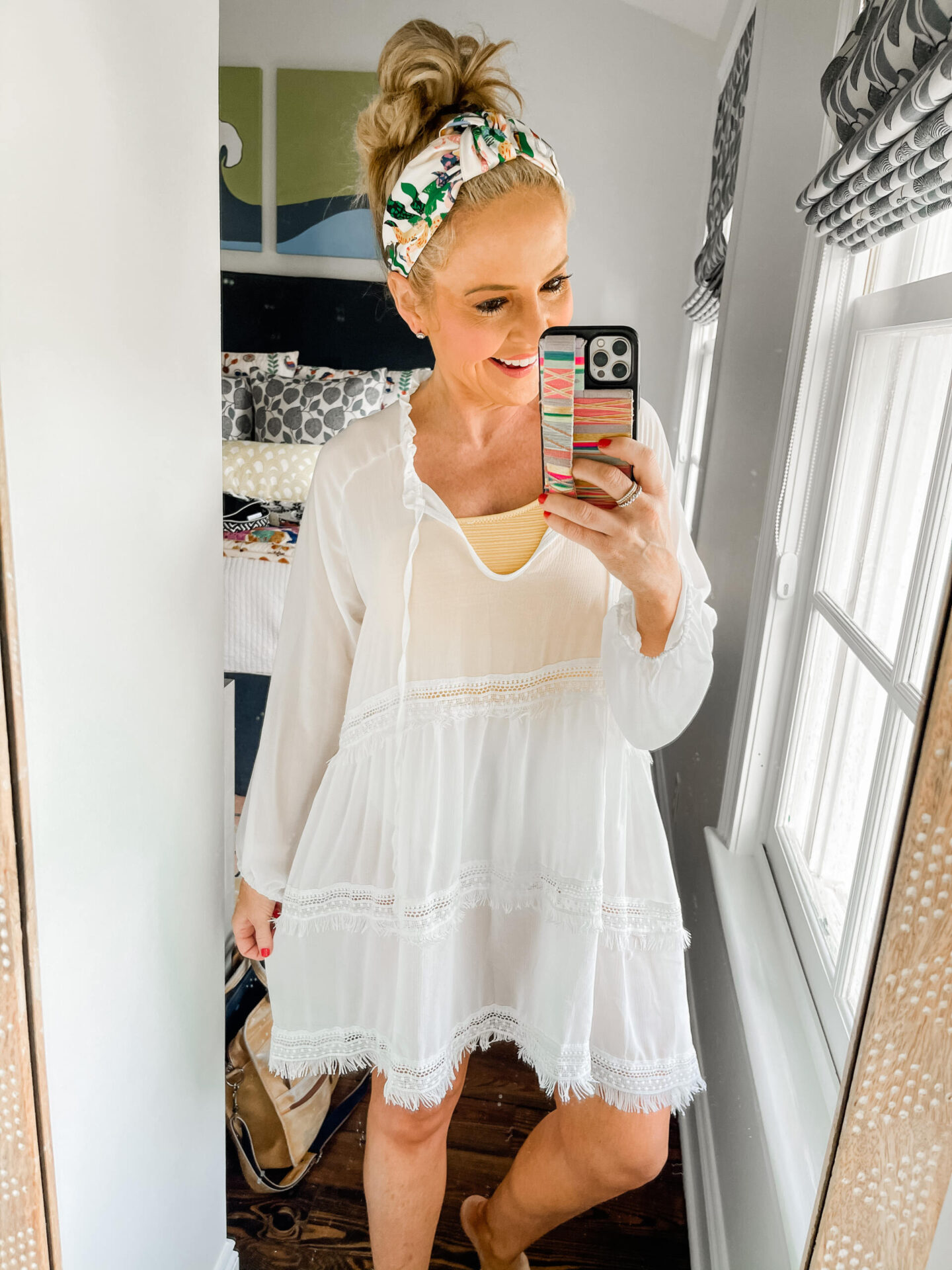 Spring Break Outfits by popular Nashville fashion blog, Hello Happiness: image of Natasha Stoneking wearing a Lace coverup, one strap yellow swimsuit, and Floral headband.