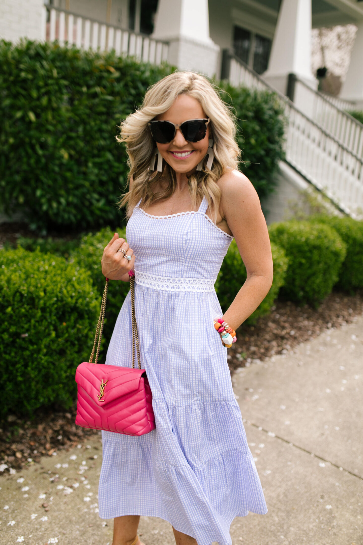 Purple Clothing by popular Nashville fashion blog, Hello Happiness: image of a woman wearing a Olivet stretch midi, Raye platforms, After hours sunglasses, and Sunshine tienda earrings.