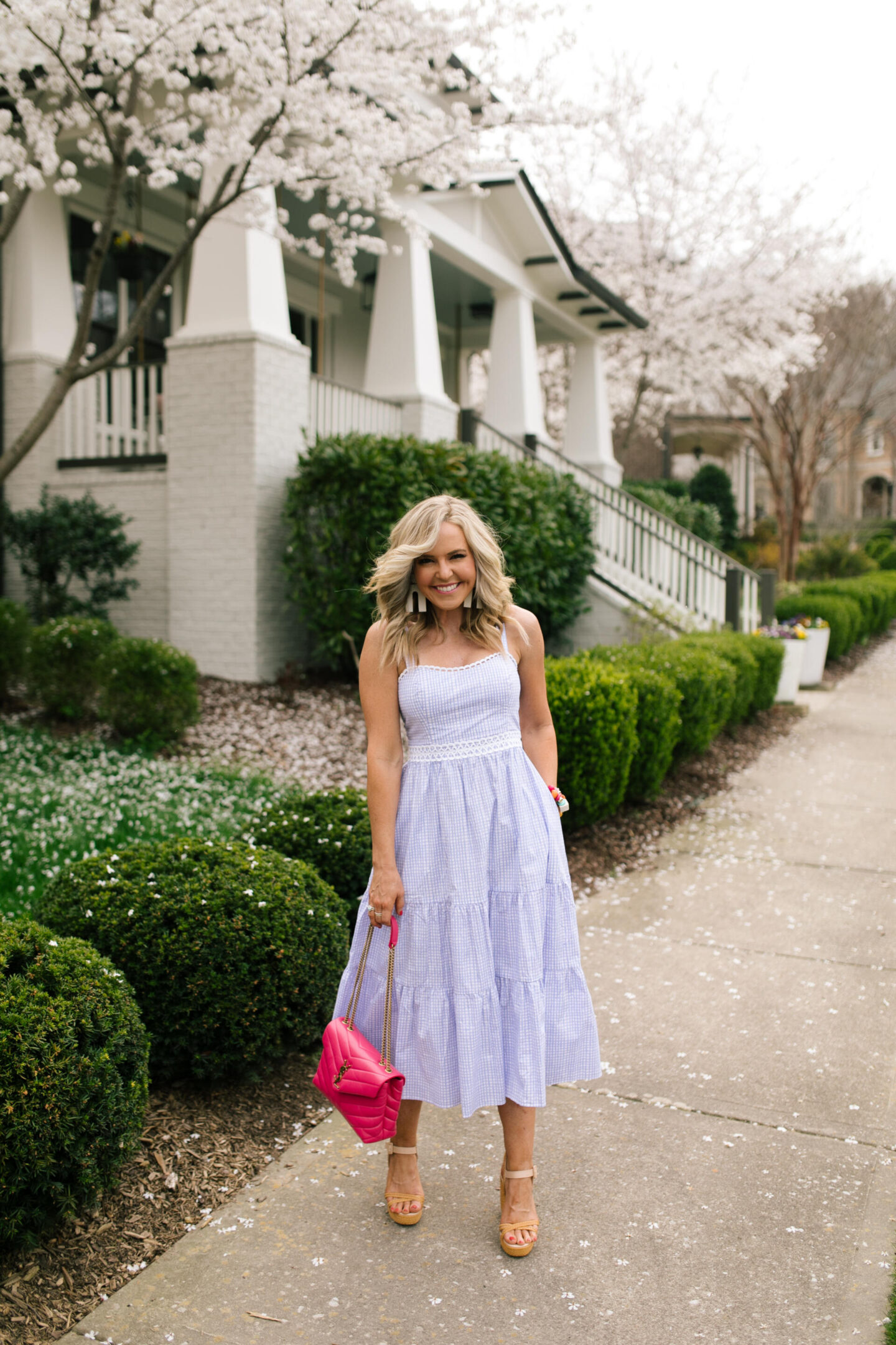 Purple Clothing by popular Nashville fashion blog, Hello Happiness: image of a woman wearing a Olivet stretch midi, Raye platforms, After hours sunglasses, and Sunshine tienda earrings.
