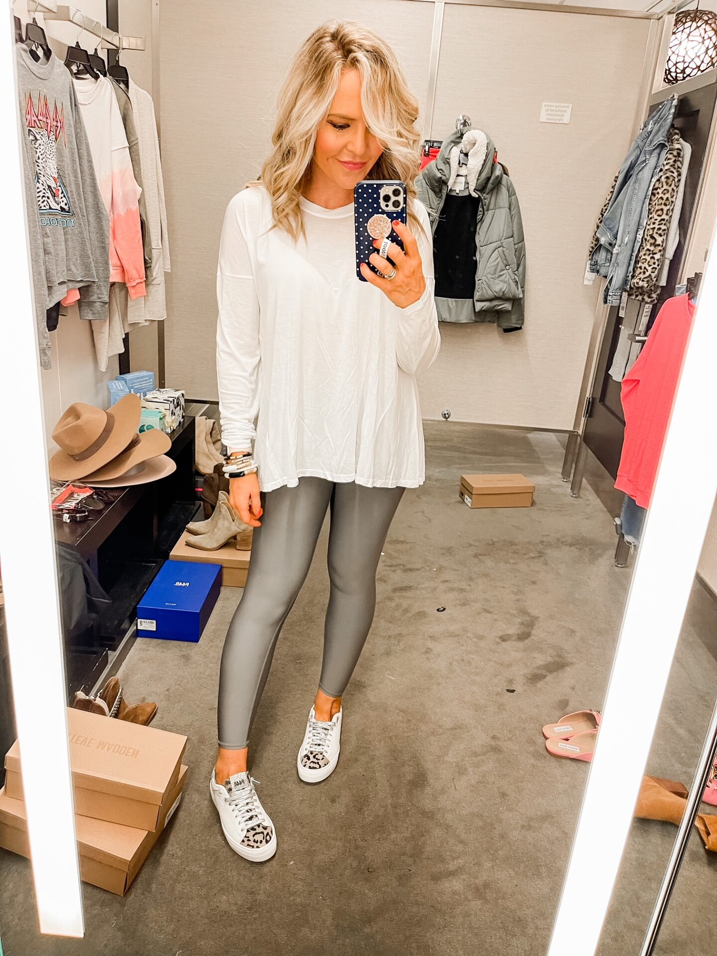 Nordstrom Anniversary Sale by popular Nashville fashion blog, Hello Happiness: image of Natasha Stoneking wearing a Nordstrom easy peavy long sleeve shirt and airlift leggings. 
