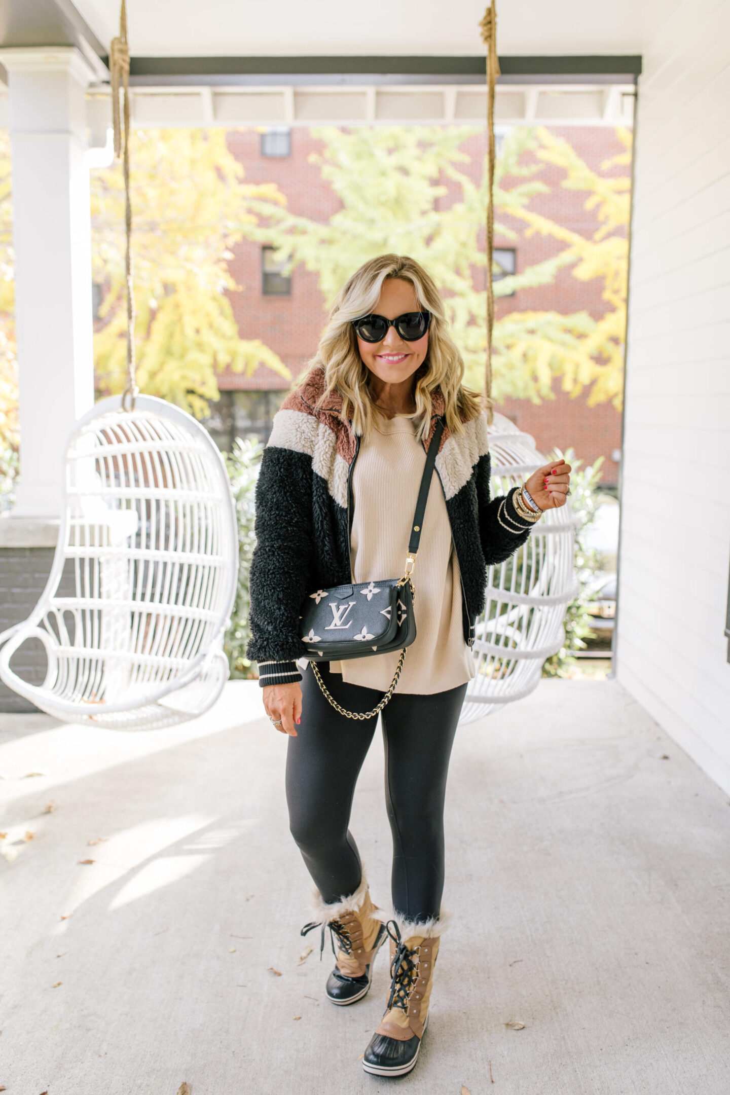 Apres Ski Fashion: Essentials for Her featured by top Nashville mom fashion blogger, Hello Happiness.