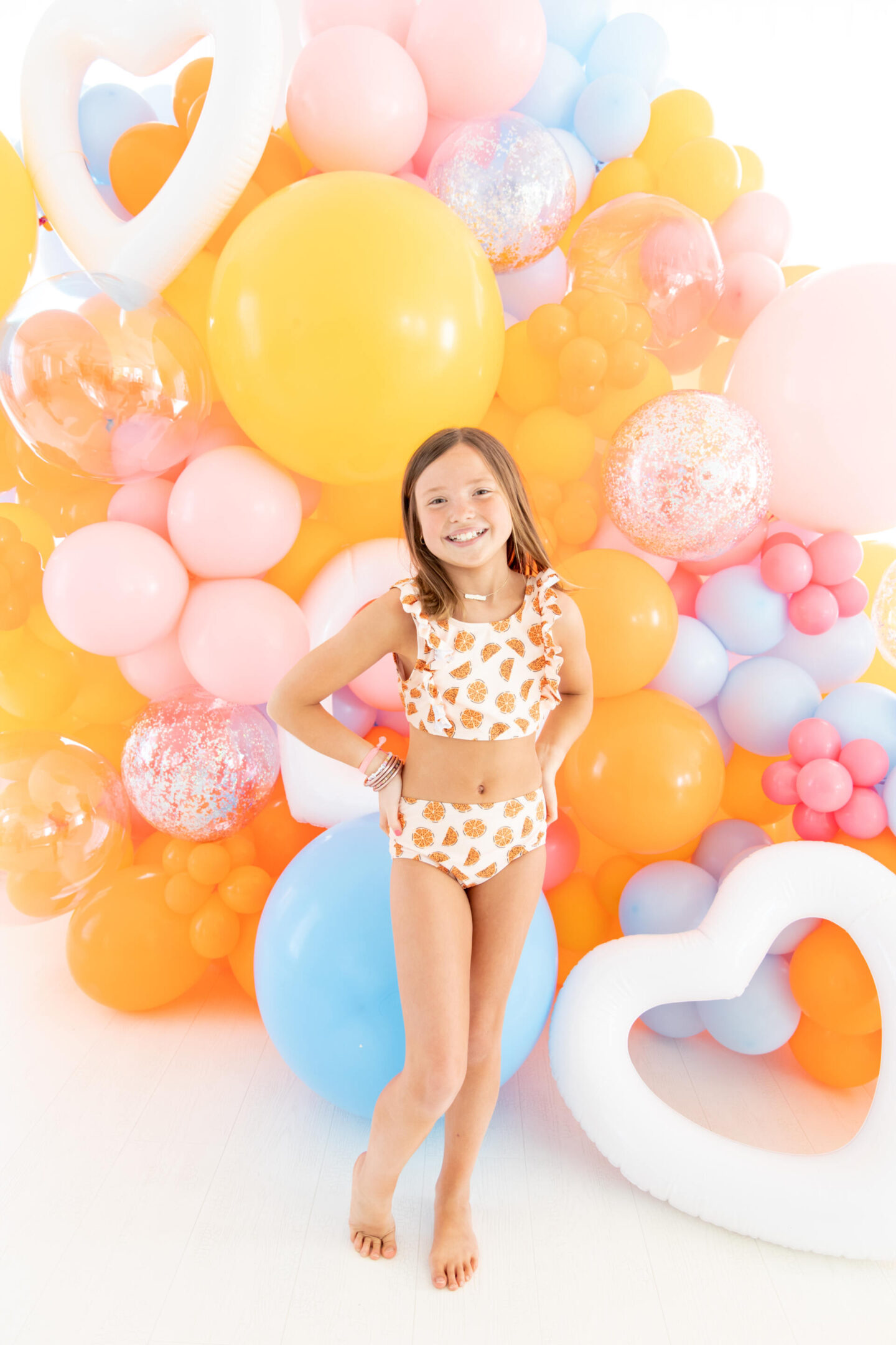 The Oaks Apparel x Hello Happiness swimsuits collection
