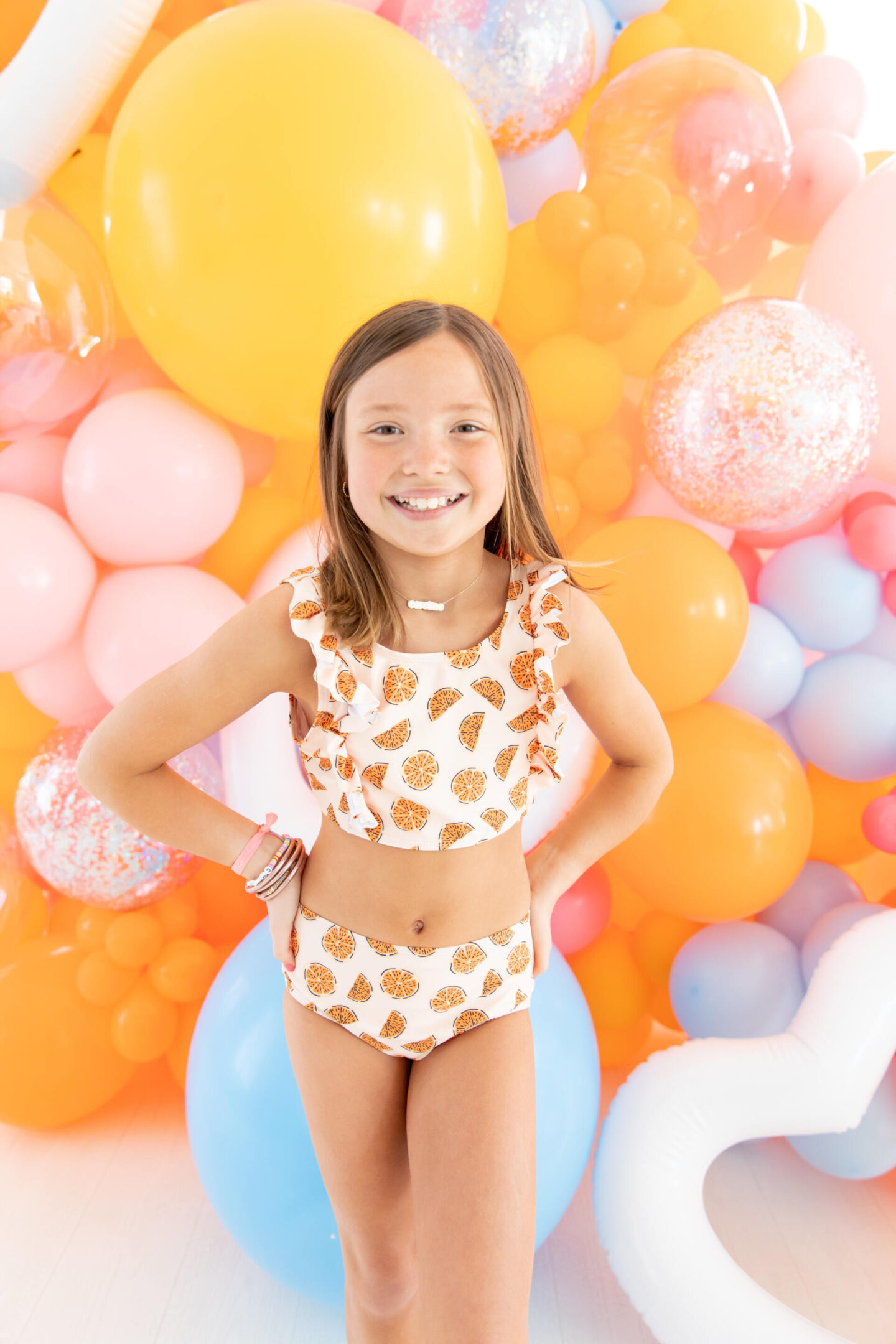 The Oaks Apparel x Hello Happiness  swimsuits collection