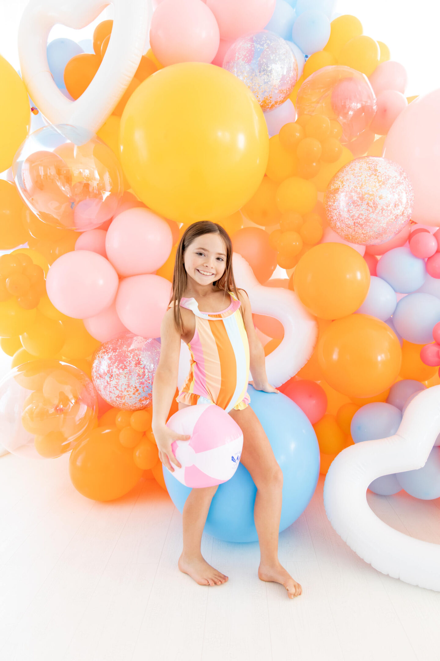 The Oaks Apparel x Hello Happiness swimsuits collection