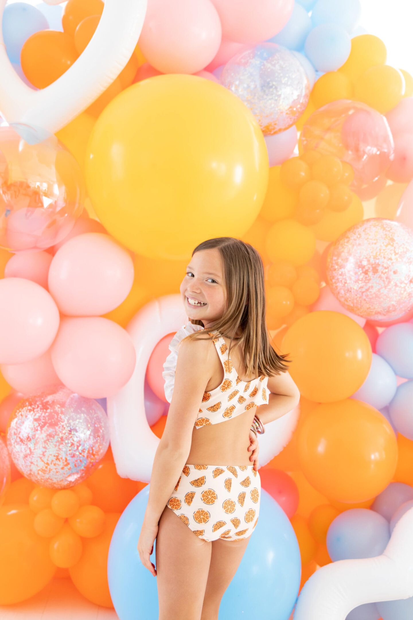 The Oaks Apparel x Hello Happiness swimsuits collection