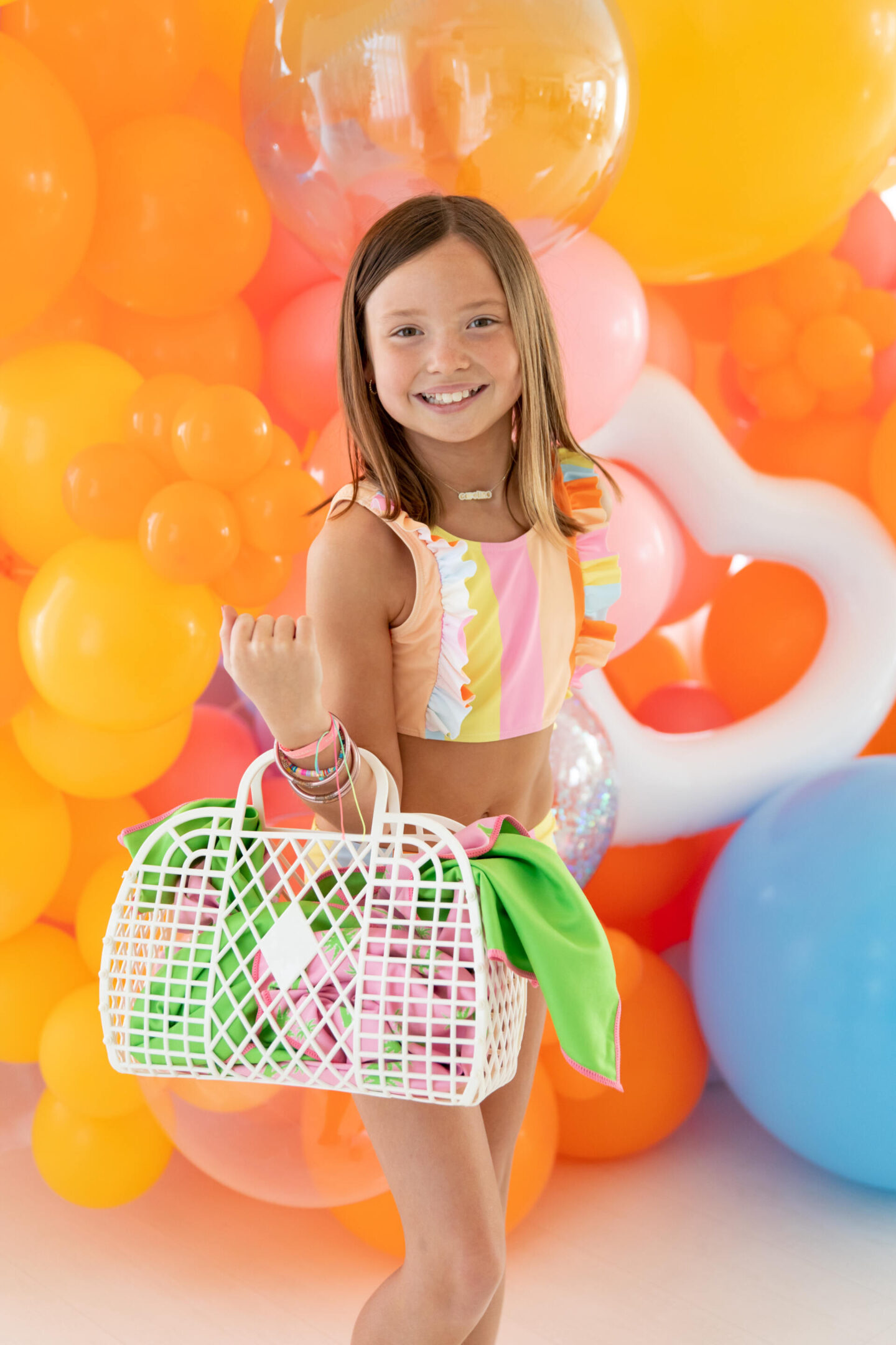 The Oaks Apparel x Hello Happiness swimsuits collection