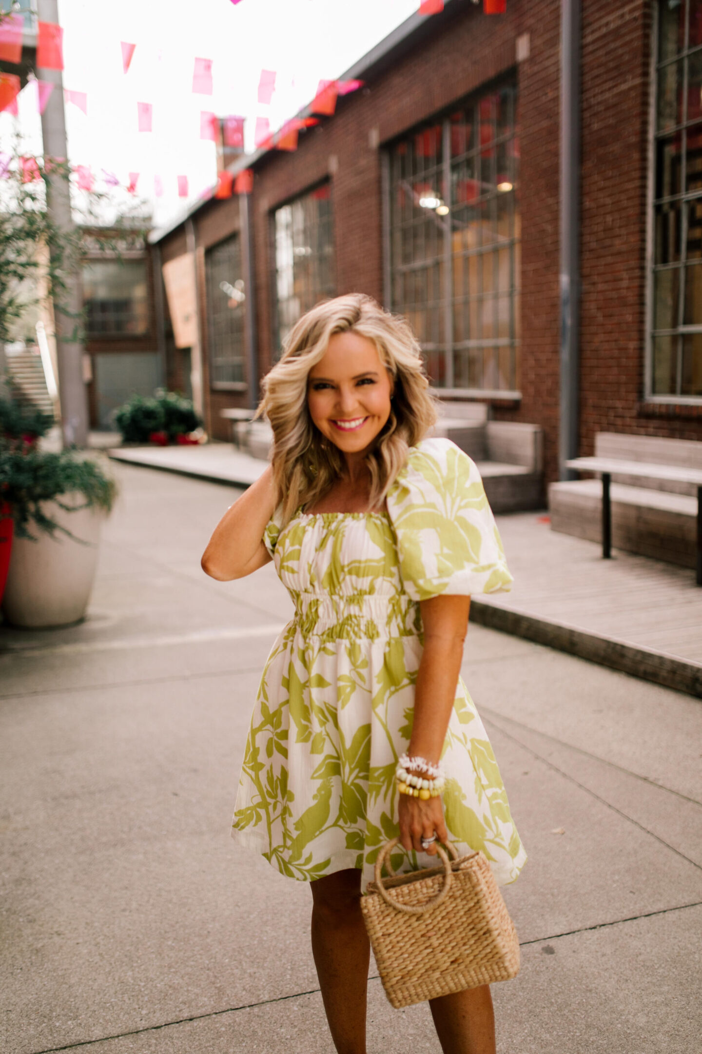 Anthropologie Sale by popular Nashville life and style blog, Hello Happiness: image of Natasha Stoneking wearing a Feliciana mini dress.