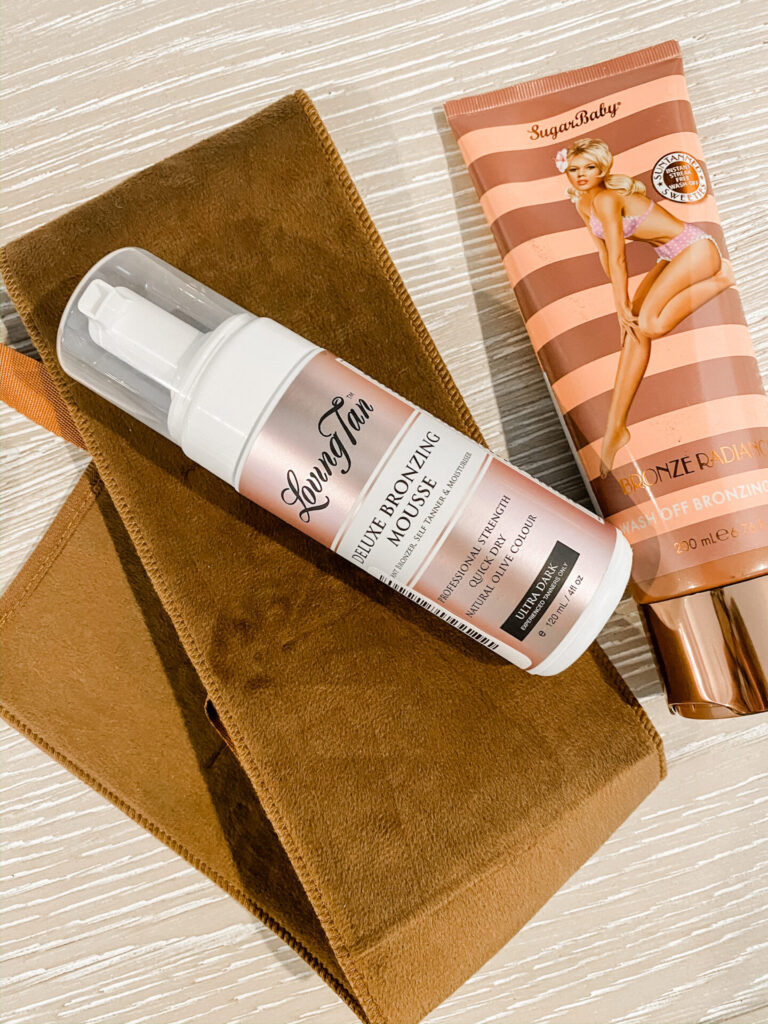 Favorite Things on Amazon by popular Nashville life and style blog, Hello Happiness: image of back self tanning applicator, Loving Tan Deluxe bronzing mousse, and Sugar Baby Instant Body Bronzer. 