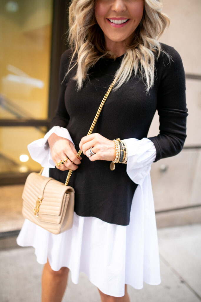 Under $100 by popular Nashville fashion blog, Hello Happiness: image of Natasha Stoneking wearing a Object Rare white and black poplin and knit dress. 