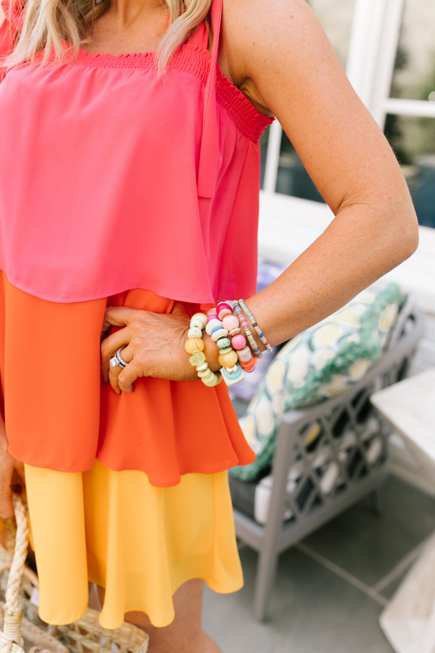 Summer Dresses by popular Nashville of Natasha Stoneking wearing a Sugarlips Colorblock Tiered dress and camel color strap platform wedge sandals.
