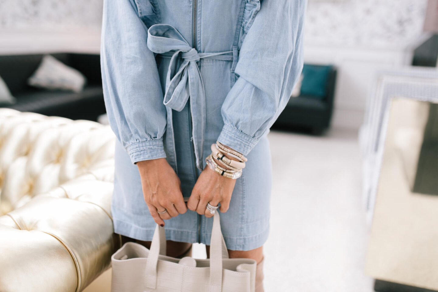 Denim Dresses by popular Nashville fashion blog, Hello Happiness: image of a woman wearing a Imogene mini dress.