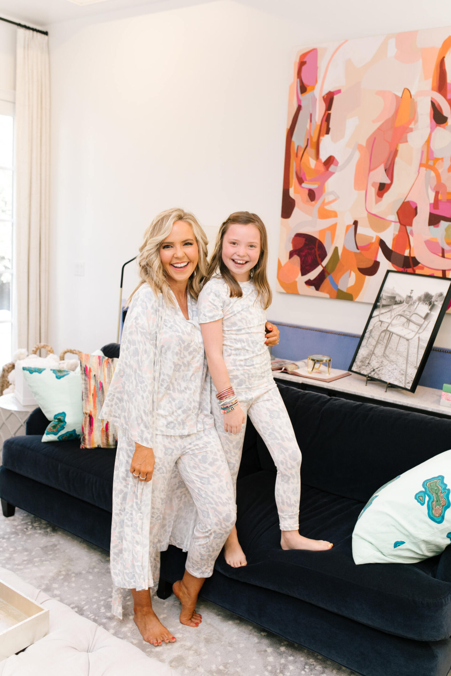 Memorial Day Sales by popular Nashville life and style blog, Hello Happiness: image of Natasha Stoneking and her daughter wearing matching Soma pajamas sets.