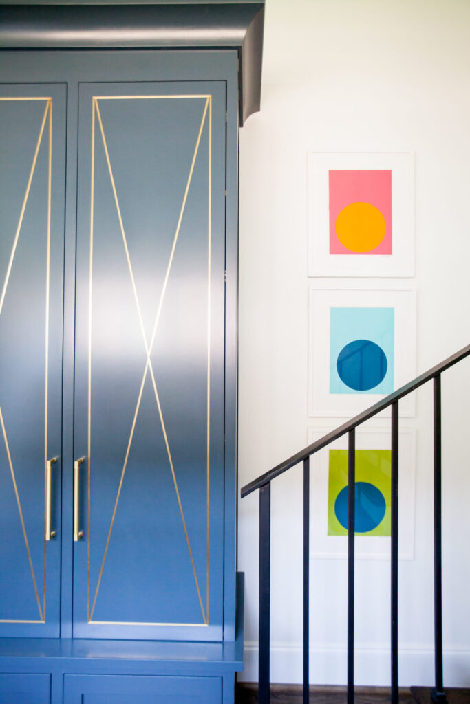 Home Paint Colors by popular Nashville life and style blog, Hello Happiness: image of a mudroom painted in Sherwin Williams Gale Force SW 7605.